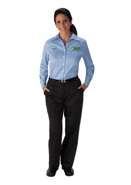 Female associate with light blue, long sleeve Publix shirt, "Serving You Since" name tag  and black pants and shoes.