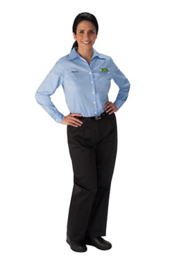 Female associate with light blue, long sleeve Publix shirt, "Serving You Since" name tag  and black pants and shoes.